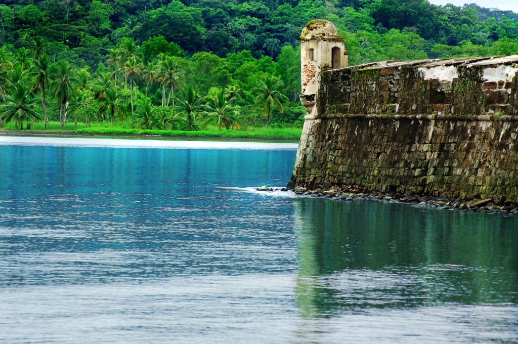 Be on the lookout for amazing scenery. Architecture In Panama Image: A fort aged and in the early stages of being reclaimed by natures has openings which overlook calm blue waters, and a vivd green forest.